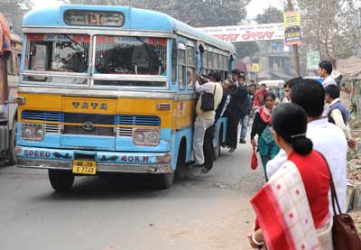সাগরের টান আর মদনের হুমকিতে বাস অমিল শহরে