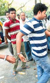 Bapi with handcuffs in standing court