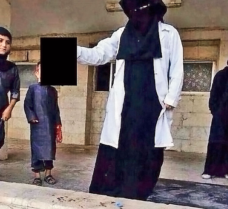 british jihadist medical student pictured holding severed head in twitter