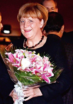 german chancellor merkel reaches delhi