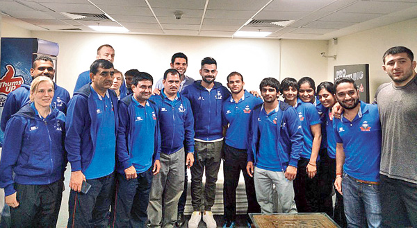 কুস্তিতে টিম কিনলেন কোহলিও