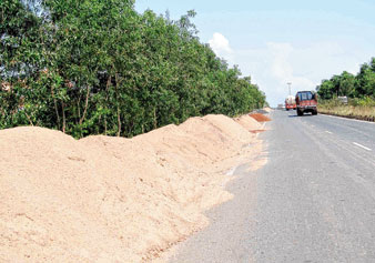 There are many sandhills on road at haldia