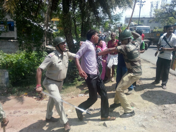 Civic volunteer attacked by police at Malda