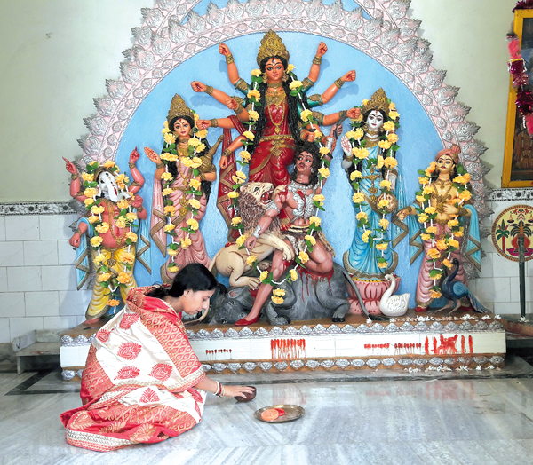 sculpture of Durga evolves from pot, tradition remains
