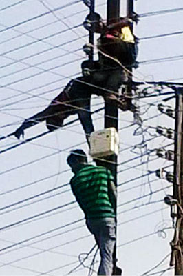 Two workers electrified while changing war