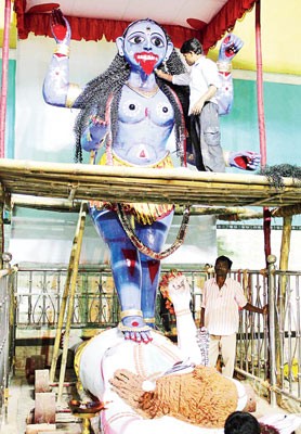 Festive mood at Balurghat for Kali puja