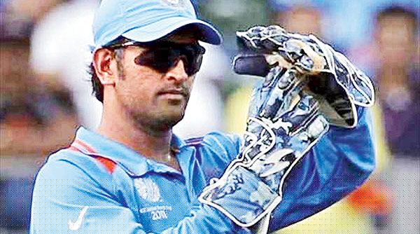 Dhoni removed gloves: a ballad