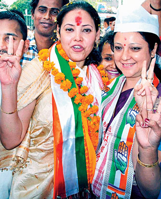 vote campaigning by two female candidates of congress