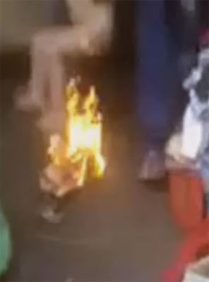 Stepfather holds three year old son over fire as punishment dgtl