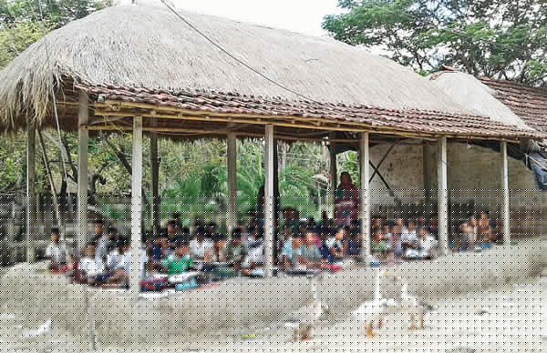 No rooms for conducting class, thatched roof turns out to be classroom