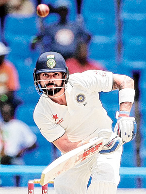 Virat Kohli shines in Viv's land, hits his 12th test ton