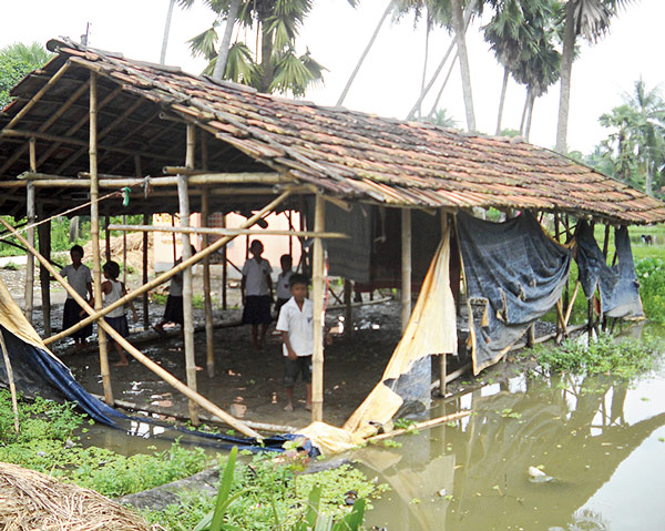 Poor condition in school, rain water in class 