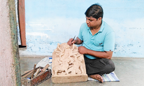 Apurba is getting praise for his wood carving work
