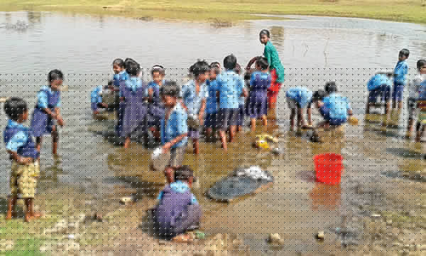 Students are dependent on a pond for drinking water and other necessities