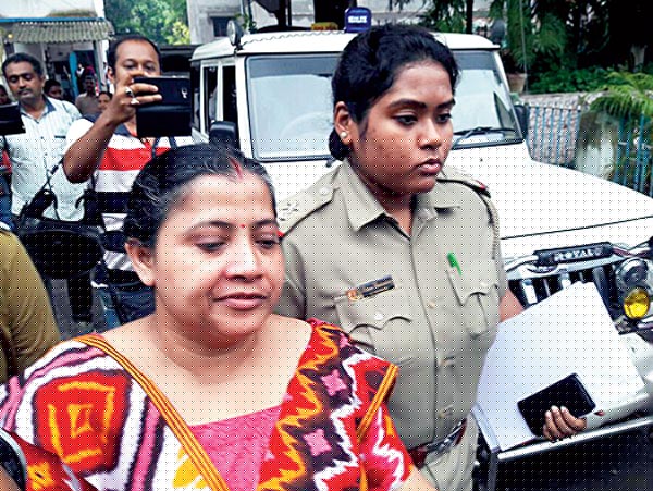 Woman caught by taking money