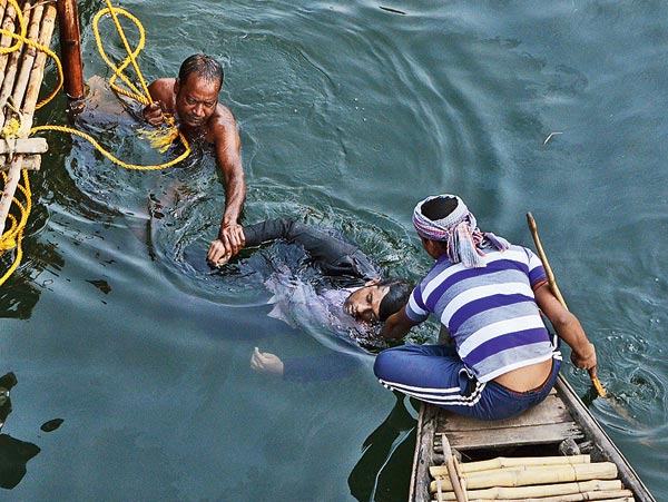 Question raised for the delay in rescue operation after the bus falls into river