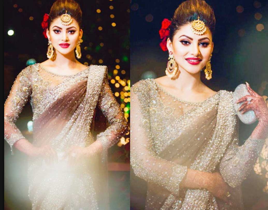 সবে সবে বলিউডে তাঁর আগমন হয়েছে। আর এখন থেকেই পোশাকে চমকাতে শুরু করেছেন উর্বশী রাউতেলা। পরিবারেরই একটি বিয়ের জন্য প্রায় ৮৩ লক্ষ টাকা দামের একটি শাড়ি পরেছিলেন অভিনেত্রী।