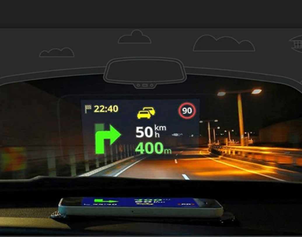 গাড়ি চালানোর সময় জিপিএস সেটিং দেখতে বারাবার মোবাইল স্ক্রিনে চোখ রাখেন। তা এড়াতে চান? তা হলে স্মার্টফোনের সাহায্যে এ ভাবে গাড়ির সামনের কাচকে বানিয়ে ফেলুন জিপিএস স্ক্রিন। ফোনের উজ্জ্বলতা বাড়িয়ে জিপিএস সেটিংস চালু করে সামনের কাচের সামনে ড্যাশবোর্ডে রেখে দিন।