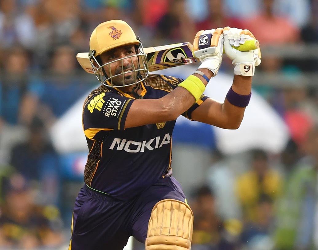 রবিন উথাপ্পা: তেমন ফর্মে নেই। চলতি আইপিএলে এখনও পর্যন্ত একটাও হাফসেঞ্চুরি করেননি। আজ তাঁর ব্যাট থেকে একটা ভাল ইনিংস চাইবে কলকাতা। ছবি: এএফপি।