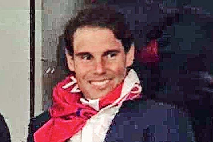 Real Madrid fan Rafael Nadal spotted at Atletico's match