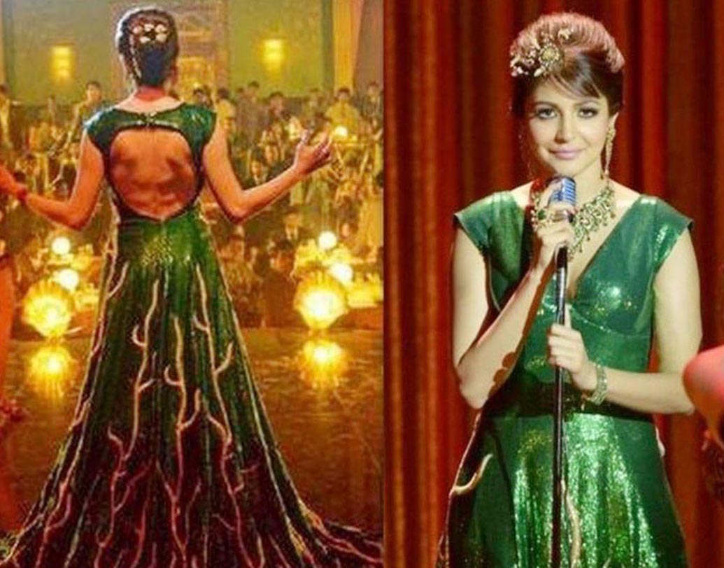 অনুষ্কা শর্মা: সোনালী কাজ করা সবুজ রঙের বড় ঘেরওয়ালা গাউন পরে স্টেজে এন্ট্রি নিয়েছিলেন অনুষ্কা শর্মা। ‘বম্বে ভেলভেট’ ছবিতে অনুষ্কার ওই স্টেজ পারফরম্যান্স বেশ জনপ্রিয় হয়েছিল। নিহারিকা বাসিন খানের ডিজাইন করা ওই গাউনটির ওজন ছিল ৩৫ কিলোগ্রাম। প্রায় আড়াই ঘণ্টা লেগেছিল অনুষ্কাকে ওই পোশাকে সাজাতে।