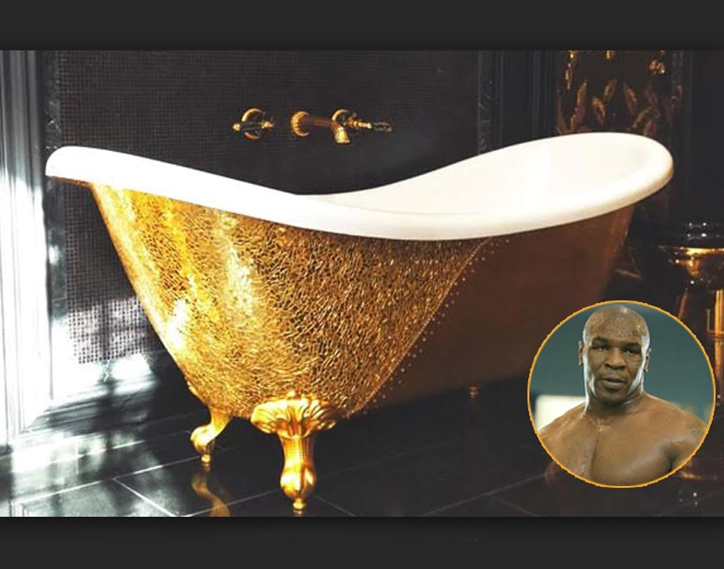 মাইক টাইসন: সাদা বাঘ পুষেই ক্ষান্ত হননি মার্কিন বক্সার মাইক টাইসন। এক সময় বক্সিং দুনিয়ার এই বাদশা স্নান করতেও ভালবাসেন রাজার মতোই। সোনার বাথটবে গা এলিয়ে স্নান করাই পছন্দ মাইকের। তাঁর স্নানঘরে তাই শোভা পায় ২৩ লক্ষ ডলারের সোনার বাথটব (ভারতীয় টাকায় যার দাম প্রায় ১৫ কোটি টাকা)।