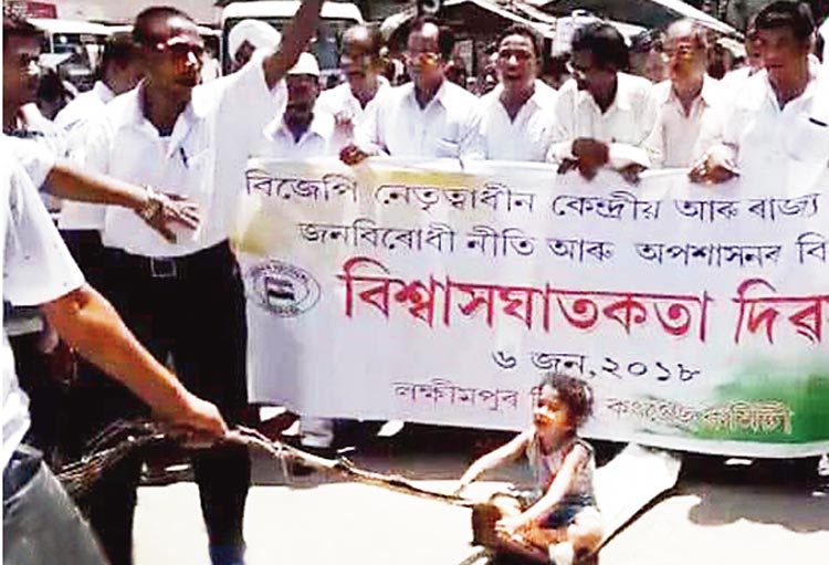 Assam congress apologizes for involving a child in their protest
