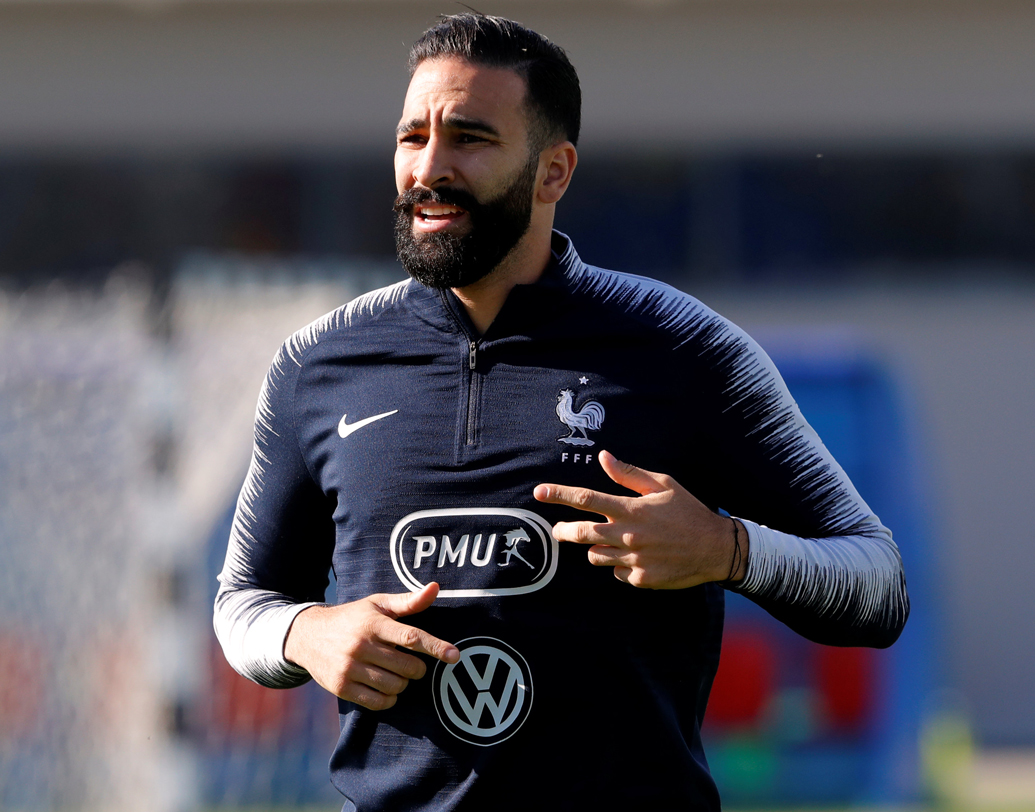 আদিল রামি। জন্ম ফ্রান্সে। বাবা-মা দু’জনেই মরক্কো থেকে আসা।এখন খেলেন ফ্রান্সেরই মার্সেই ক্লাবে। ছবি: রয়টার্স।