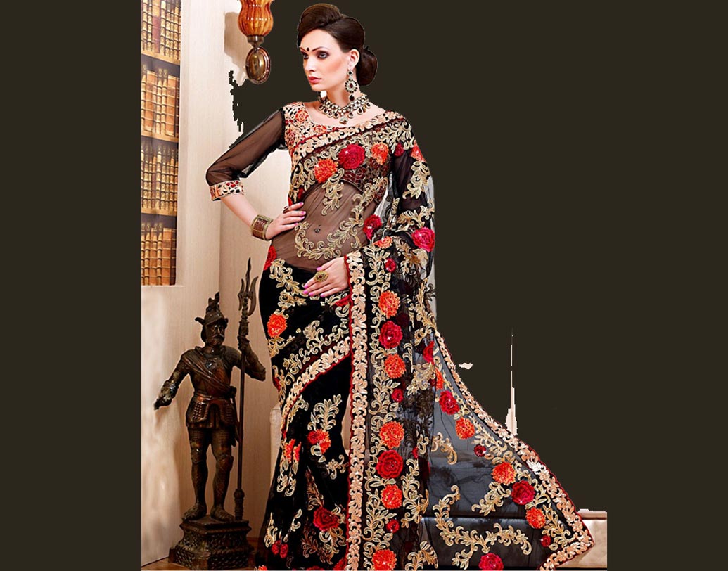 গুজরাতের জারদৌসি: অ্যাপলিক এবং জরি-চুমকির মিশ্রণে তৈরি হয় জারদৌসি কাজ। খুব উজ্জ্বল এই শাড়িটি মূলত সুরাতে তৈরি হয়।