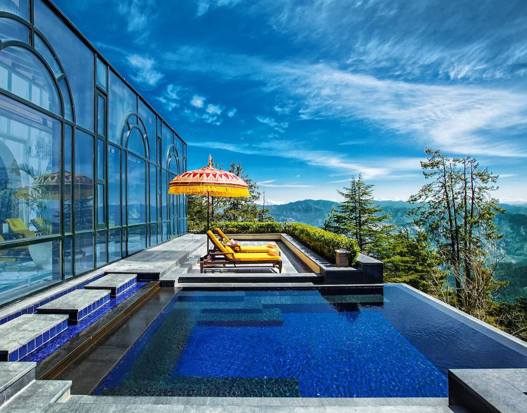 ওয়াইল্ডফ্লাওয়ার হল, শিমলা: সপরিবার শিমলা গেলে এই হোটেল আপনার জন্য আদর্শ। সিমলা থেকে ১৩ কিমি দূরত্বের এই হোটেল পাবেন পাঁচ তারা পরিষেবা। সবচেয়ে আকর্ষণ এর সুইমিং পুলটি। পাহাড়ি সৌন্দর্য, আবহাওয়া অনুসারে গরম ঘর আর গভীর সুইমিং পুলটি আপনার বেড়ানোকে করে তুলবে আনন্দের! খরচ ২৬,০০০ টাকা (প্রতি দিন/দু’জন)।