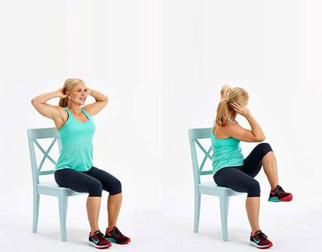 চেয়ারে বসে দু’হাত ভাঁজ করে মাথার পিছনে দিন। এ বার এক এক করে হাঁটু ভাঁজ করা অবস্থায় মাটি থেকে পা তুলুন। ডান হাতের কনুই দিয়ে বাঁ হাঁটু ও বাঁ হাতের কনুই দিয়ে ডান হাঁটু ছোঁয়ার চেষ্টা করুন। বার পনেরো করুন। এতে আপনার কোমরের মেদ তো ঝরাবেই, সঙ্গে শরীরের একাংশ কিছুটা ভাঁজ হওয়ার দরুন পেটের অতিরিক্ত চর্বিও গলবে সহজে।