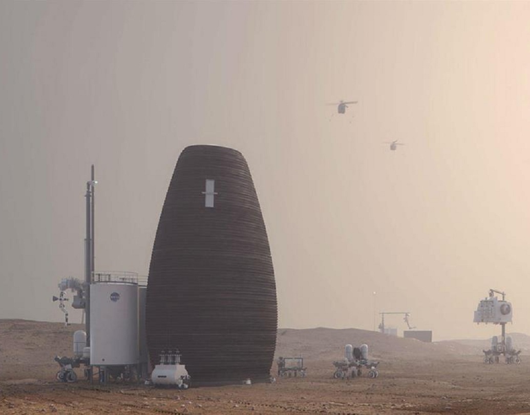 কয়েকটি বাড়ি দেখতে খানিকটা মাটির তৈরি উল্টোনো ফুলদানির মতো। তবে ঝাঁ চকচকে। ধূলো ঝড় ও রুক্ষ আবহাওয়ায় কোনও ক্ষতি হবে না। উচ্চতা বেশি হওয়ায় জায়গা মিলবে অনেকটা। ল্যাব, রান্নাঘর, শোওয়ার ঘর সমেত সংসার সাজিয়ে দেওয়া হবে মহাকাশচারীদের।