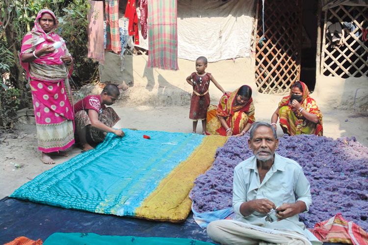 Temperature is gradually decreasing, quilt makers are busy to make quilts in Gopalpur