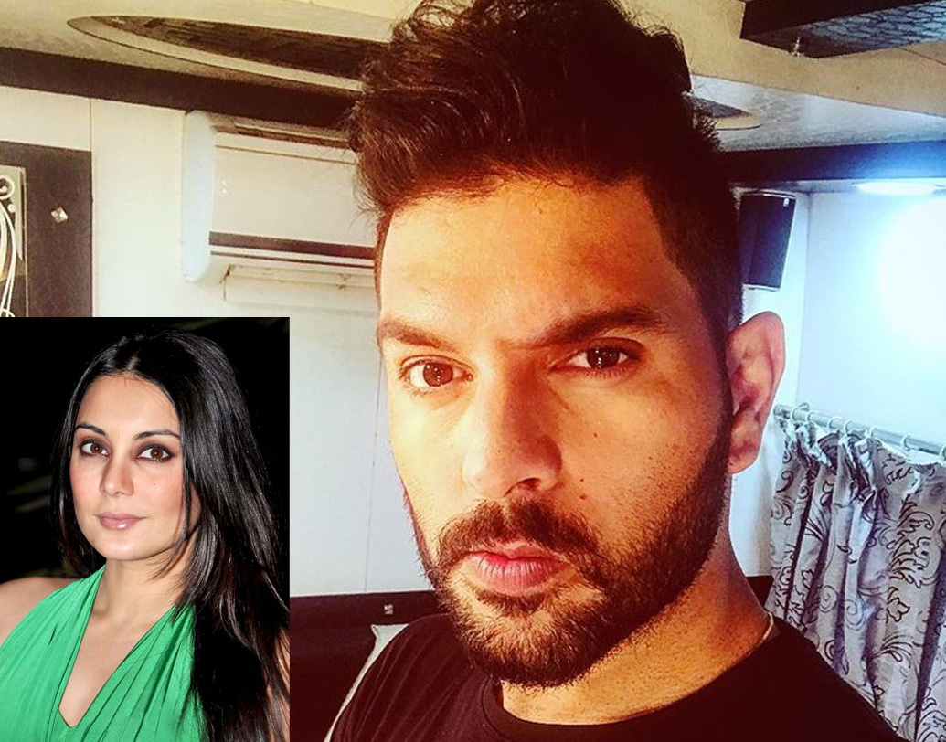 ২০১১ সালে ইন্টারেনেটে একটি ছবি ছড়িয়ে পড়ে। নেটিজেনদের দাবি, সেখানে যুবরাজ-মিনিশা চুম্বনরত ছিলেন। কিন্তু মিনিশা সেই দাবি উড়িয়ে দেন। তাঁর দাবি, যুবরাজের সঙ্গে যিনি ছিলেন, তিনি তাঁর লুক অ্যালাইক। কিন্তু তিনি নিজে নন। (ছবি: সোশ্যাল মিডিয়া)