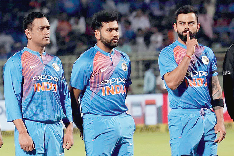 India players observe a minute’s silence in memory of the CRPF jawans killed in the Pulwama