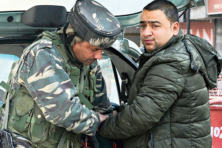 An artist is making picture gallery of missing persons and their near ones in Kashmir as a protest 