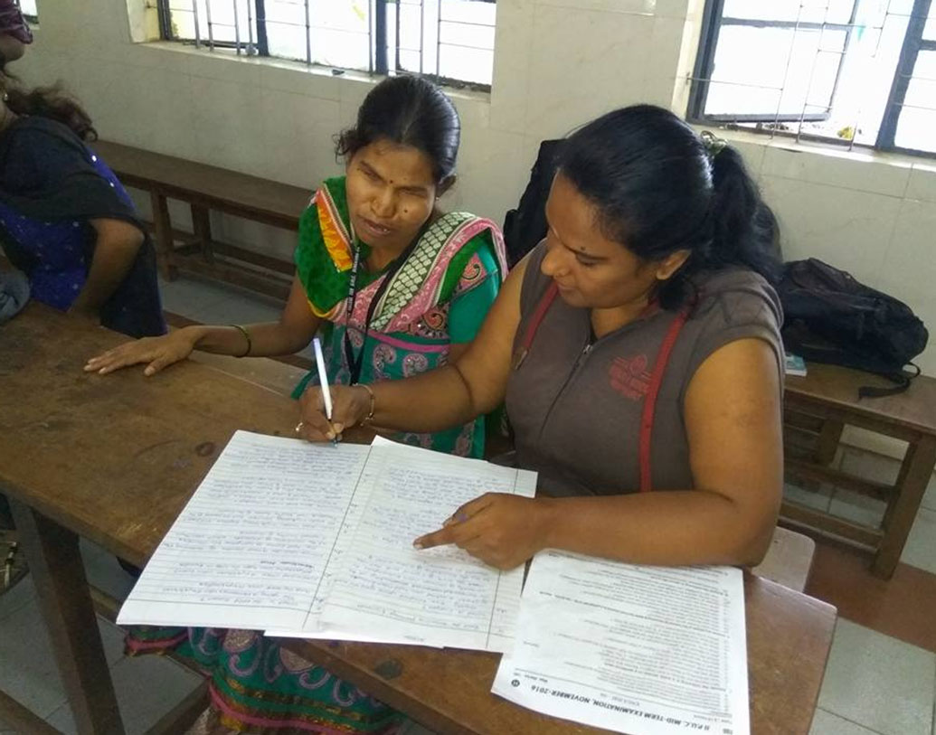 পুষ্পা একজন স্ক্রাইব, প্রায় ৭০০ জন শারীরিক প্রতিবন্ধী ব্যক্তিকে সাহায্য করেছেন তিনি পরীক্ষা দিতে। লিখেছেন তাঁদের হয়ে।