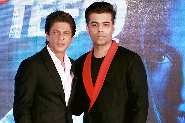 Karan Johar blames technical error after liking an insulting tweet about Shah Rukh Khan