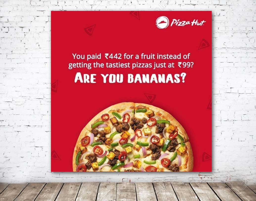 উইকএন্ড পার্টিতে বন্ধুবান্ধবদের জমায়েত। অথচ পিৎজা হবে না! তা-ও আবার হয় নাকি? পিৎজাহাট বলছে, ৪৪২ টাকা খরচ করবেন না। বরং প্রতি পিৎজায় ৯৯ টাকা দিন। সঙ্গে ‘আর য়ু গেম?’-এর কায়দায় বেশ বুদ্ধিদীপ্ত ট্যাগলাইন ‘আর য়ু ব্যানানাস’! কি রাজি তো?