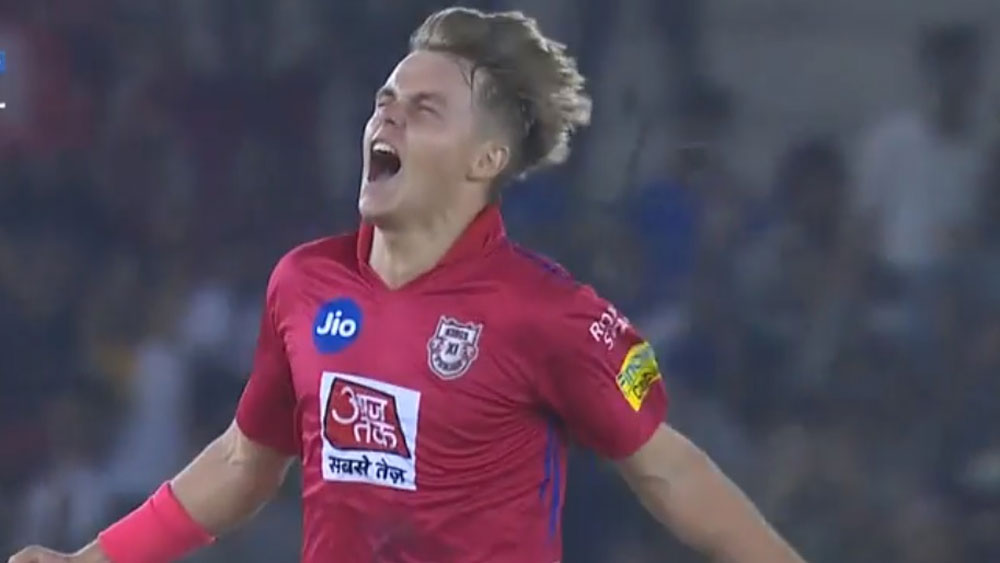 ১২তম আইপিএলে মূলত স্যাম কুরানের হ্যাটট্রিকের সৌজন্যেই দিল্লি ক্যাপিটালসের বিরুদ্ধে ১৪ রানে রুদ্ধশ্বাস জয় ছিনিয়ে নেয় কিংস ইলেভেন পঞ্জাব। মোট ৯ ম্যাচে ১০টি উইকেট নিয়েছিলেন সে বার। তবে শুধু বল হাতেই নয়, ব্যাটেও তাঁর সাবলীল দেখিয়েছে স্যামকে। ৯৫ রান করলেও তিনি যে অনায়াসে বড় শট নিতে পারেন, তা-ও দেখিয়েছিলেন।