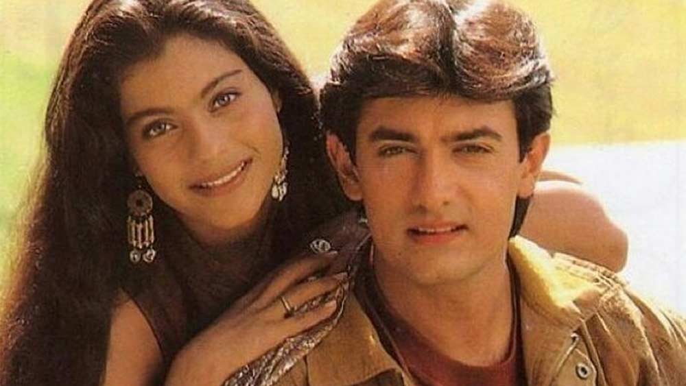 কাজল কেমন তা জানতে আমিরকেই জিজ্ঞাসা করেন এসআরকে। কাজলকে চিনতেন আমির। “সেলেবের(তনুজা) মেয়ে, তাই অ্যাটিটিউড প্রবলেম থাকতে পারে”, কাজল সম্পর্কে শাহরুখকে এমনটাই বলেন আমির।