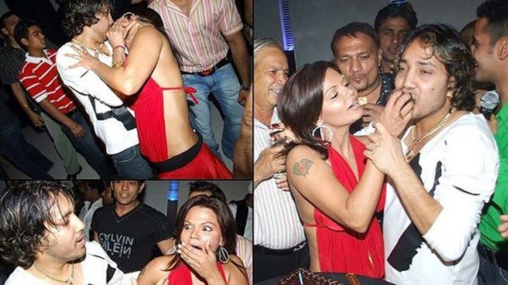 মিকার কথায়, “রাখিকে আমি আমন্ত্রণই জানাইনি। আশিসের সঙ্গেই ও এসেছিল। পার্টিতে শুরু থেকেই ও আমার সঙ্গে একটু বেশি ফ্রেন্ডলি হতে চাইছিল। আমি যদিও বিশেষ পাত্তা দিচ্ছিলাম না। আমি সবাইকে বলেছিলাম আমায় যেন কোনও ভাবেই মুখে কেক না মাখানো হয়। আমার অ্যালার্জি রয়েছে।”