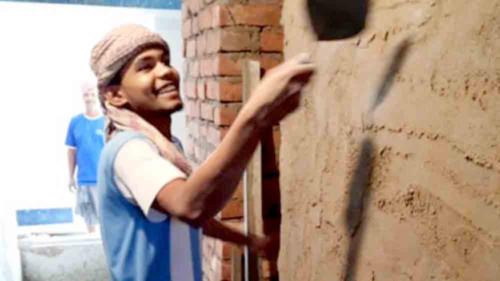 labourer from Shyampur scored  64 percent in Madhyamik