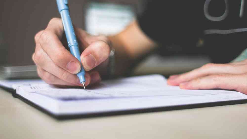 লিখে বোঝান