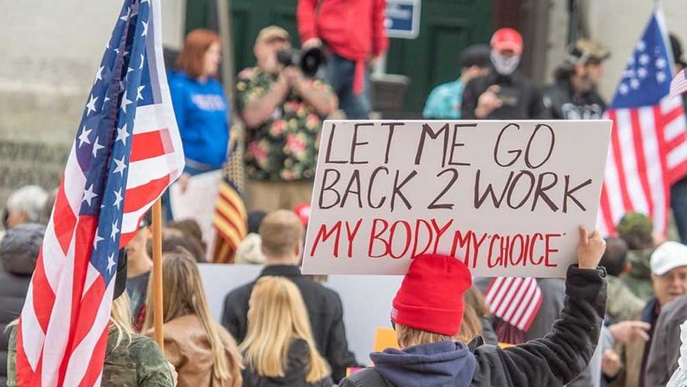 বিধিনিষেধ তোলার দাবিতে বিক্ষোভ 