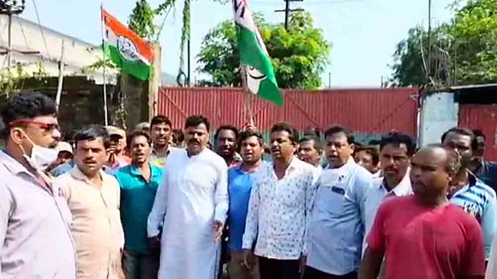agitation by TMC's leaders and workers of TMC in front of a gate of factory in Gangajalghati