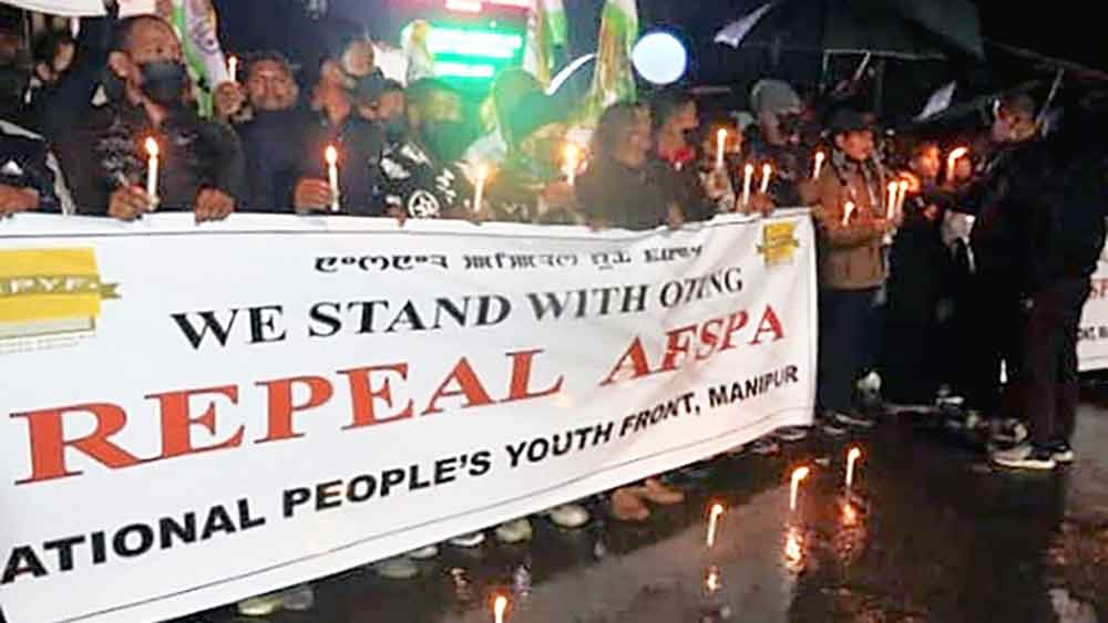 আফস্পা প্রত্যাহারের দাবিতে মোমবাতি মিছিল। ইম্ফলে।