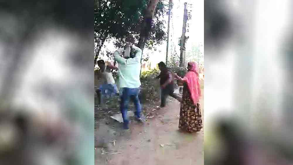 pradhan from Harischandrapur started to act violently in a viral video 