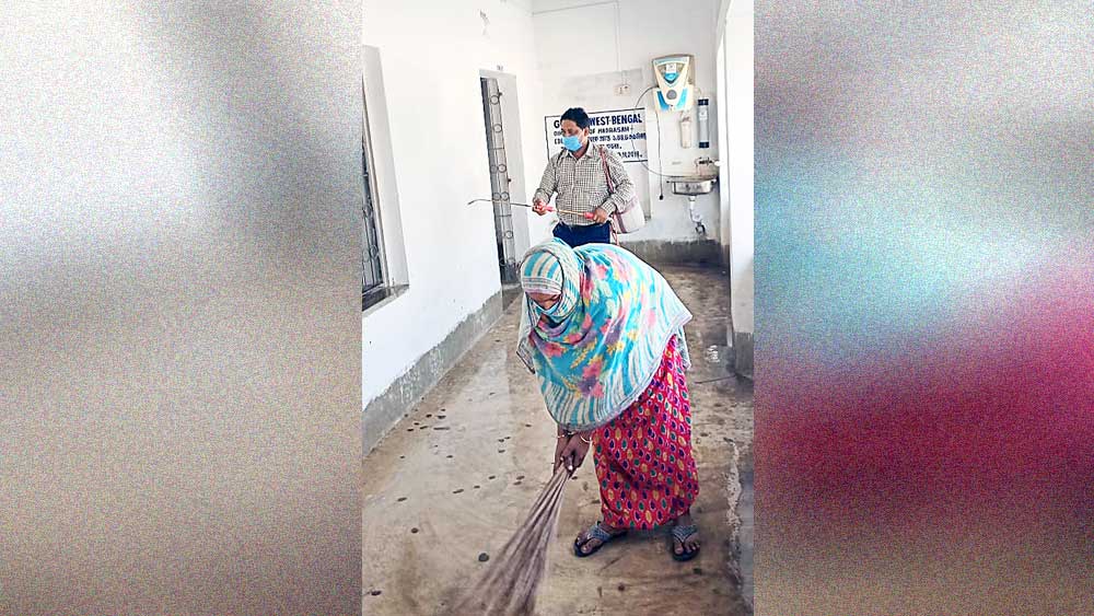 residents with teachers are cleaning Madrasa in Shyampur