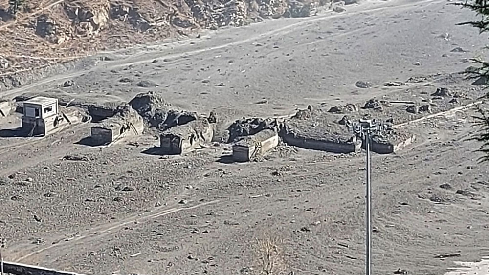 বন্যার পর ভাঙাচোড়া তপোবন এলাকা